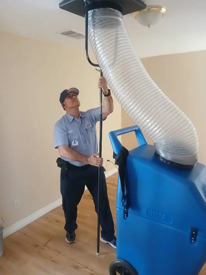 Mini Split Installation technician using HEPA equipment in Zachary